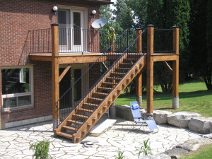 Hammered bar balcony with staircase